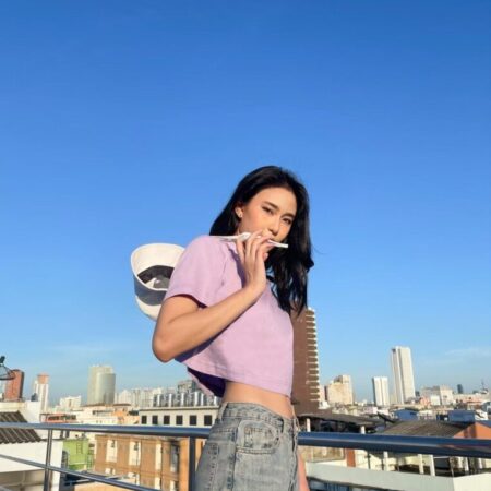 Female model with Oversized Crop Top Pastel Purple T-shirt.