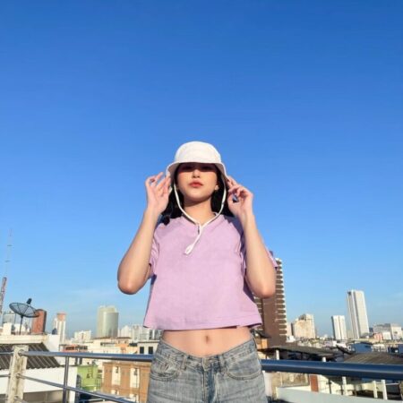 Female model with Oversized Crop Top Pastel Purple T-shirt.