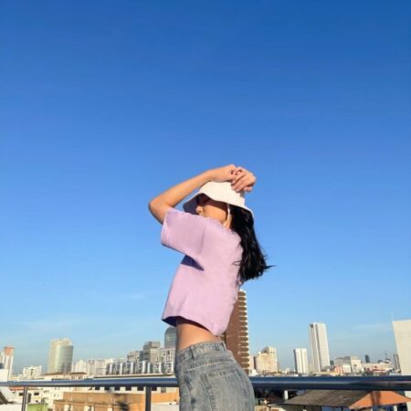 Female model with Oversized Crop Top Pastel Purple T-shirt.