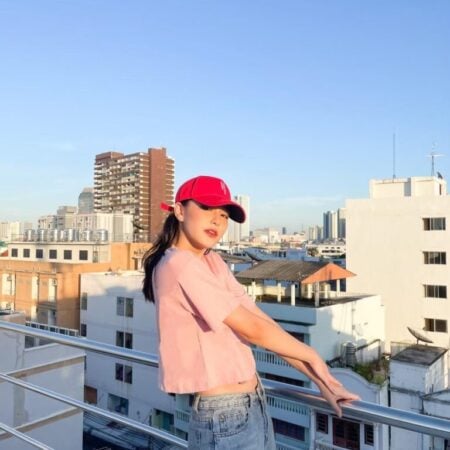 Female model with Oversized Crop Top Pastel Pink T-shirt.