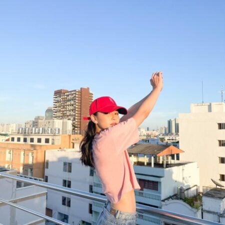 Female model with Oversized Crop Top Pastel Pink T-shirt.