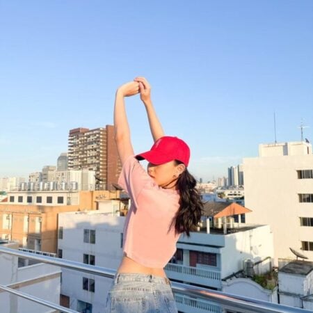 Female model with Oversized Crop Top Pastel Pink T-shirt.