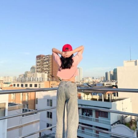 Female model with Oversized Crop Top Pastel Pink T-shirt.