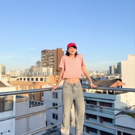 Female model with Oversized Crop Top Pastel Pink T-shirt.