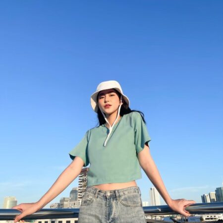 Female model with Oversized Crop Top Pastel Green T-shirt.