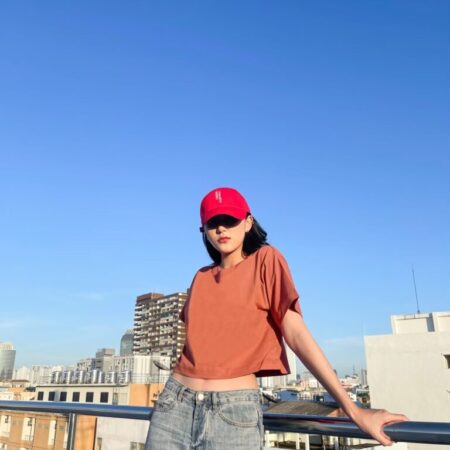 Female model with Oversized Crop Top Brick Orange T-shirt.