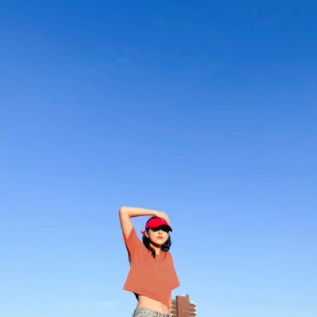 Female model with Oversized Crop Top Brick Orange T-shirt.