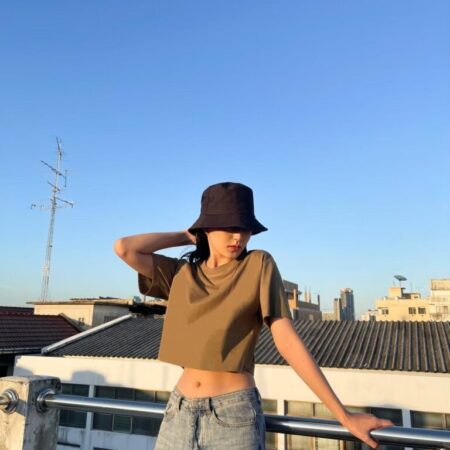 Female model with Oversized Crop Top Olive T-shirt.