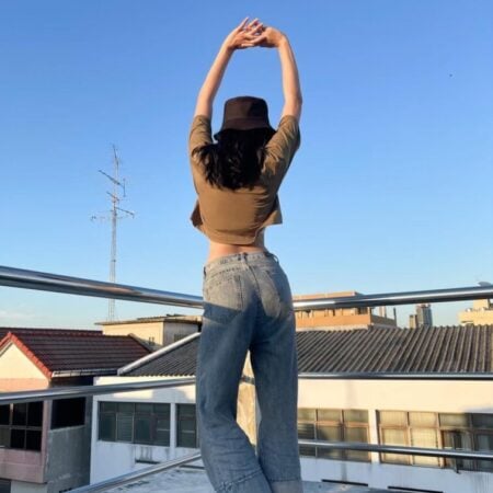 Female model with Oversized Crop Top Olive T-shirt.