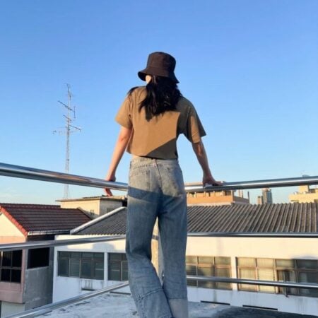 Female model with Oversized Crop Top Olive T-shirt.