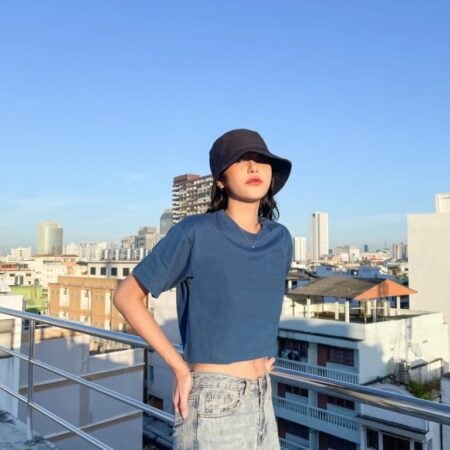Female model with Oversized Crop Top Navy Blue T-shirt.