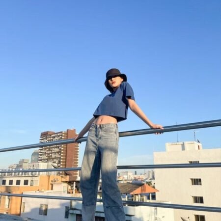 Female model with Oversized Crop Top Navy Blue T-shirt.