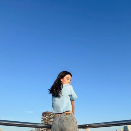 Female model with Oversized Crop Top Blue T-shirt.