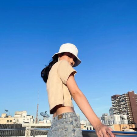 Female model with Oversized Crop Top Beige T-shirt.
