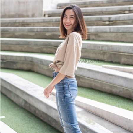 Women model with Oversized Beige T-shirt.