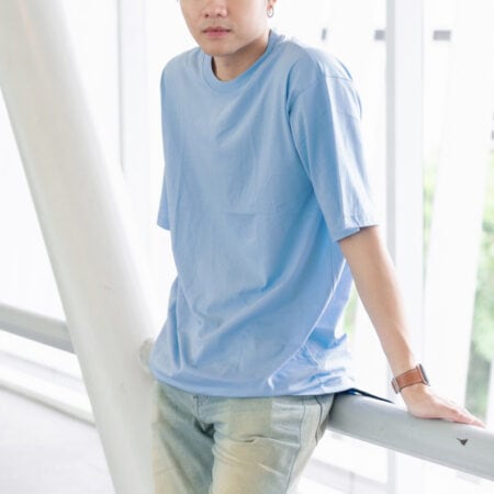 Men model with Oversized Pastel Blue T-shirt.