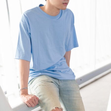 Men model with Oversized Pastel Blue T-shirt.