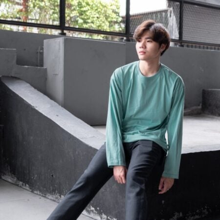 Male model with Oversized Long Sleeves Pastel Green T-shirt.