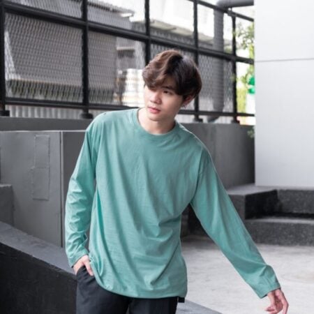 Male model with Oversized Long Sleeves Pastel Green T-shirt.