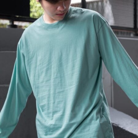 Male model with Oversized Long Sleeves Pastel Green T-shirt.