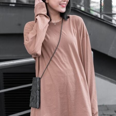 Female model with oversized long sleeves Light Chocolate T-shirt.
