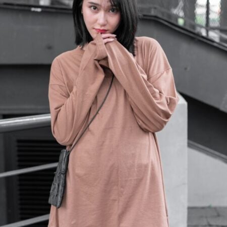 Female model with oversized long sleeves Light Chocolate T-shirt.