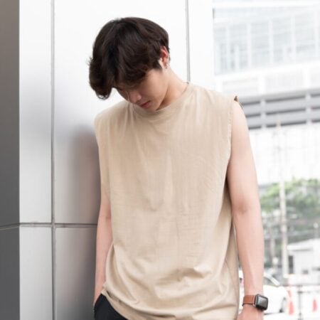 Male model with Oversized Tank Top Beige T-shirt.