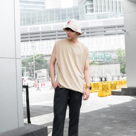 Male model with Oversized Tank Top Beige T-shirt.