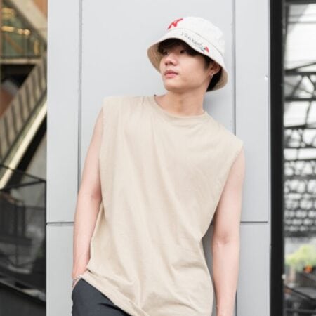 Male model with Oversized Tank Top Beige T-shirt.