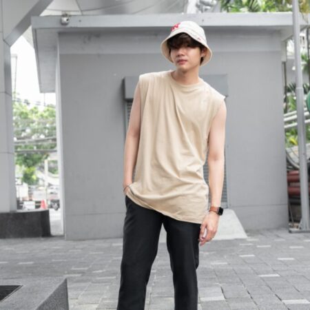 Male model with Oversized Tank Top Beige T-shirt.