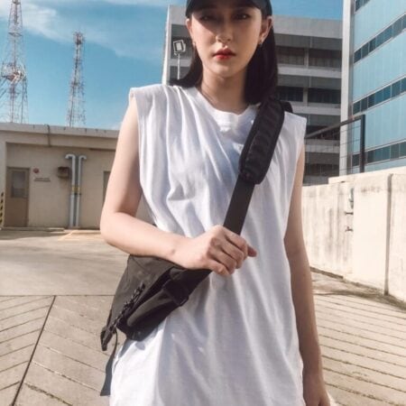 Female model with Oversized Tank Top White T-shirt.