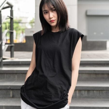 Female model with Oversized Tank Top Black T-shirt.