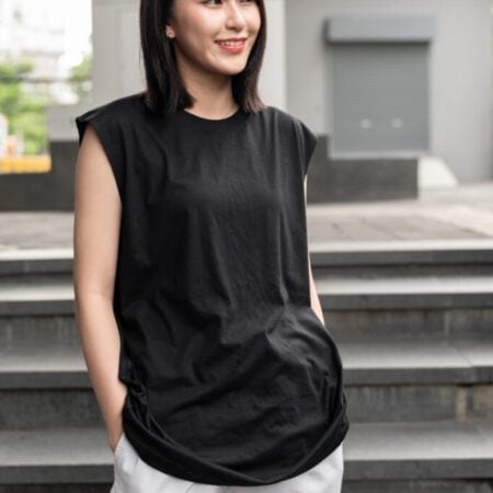 Female model with Oversized Tank Top Black T-shirt.