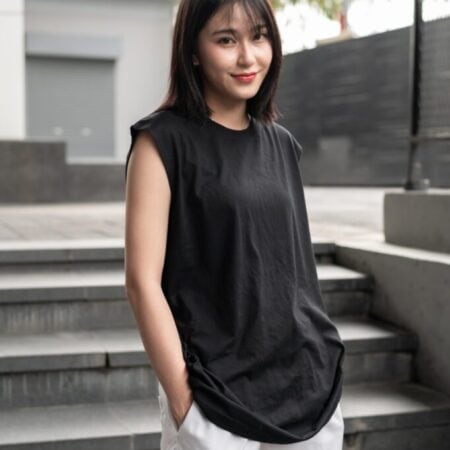 Female model with Oversized Tank Top Black T-shirt.