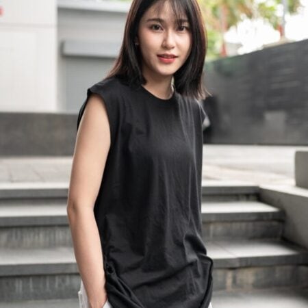 Female model with Oversized Tank Top Black T-shirt.