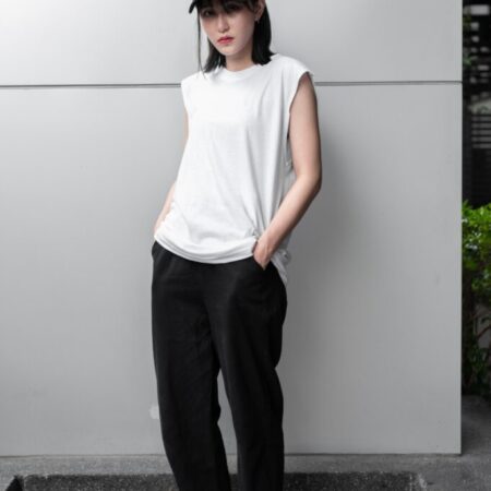 Female model with Oversized Tank Top White T-shirt.