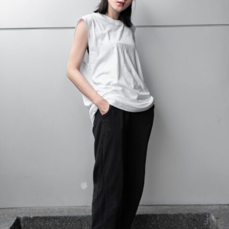 Female model with Oversized Tank Top White T-shirt.