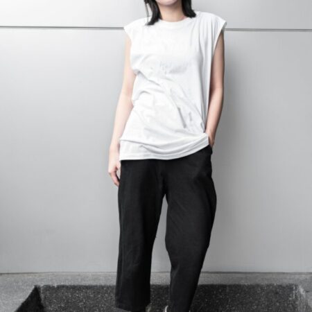 Female model with Oversized Tank Top White T-shirt.
