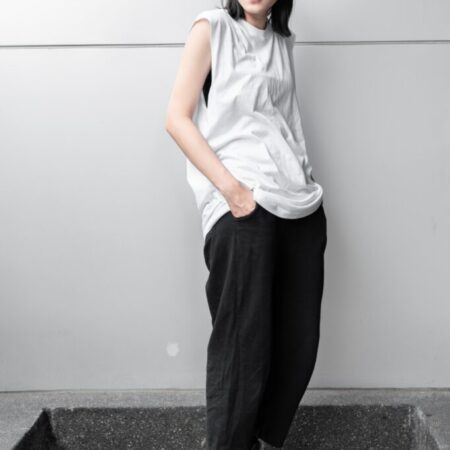 Female model with Oversized Tank Top White T-shirt.