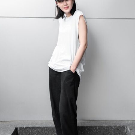 Female model with Oversized Tank Top White T-shirt.