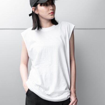 Female model with Oversized Tank Top White T-shirt.