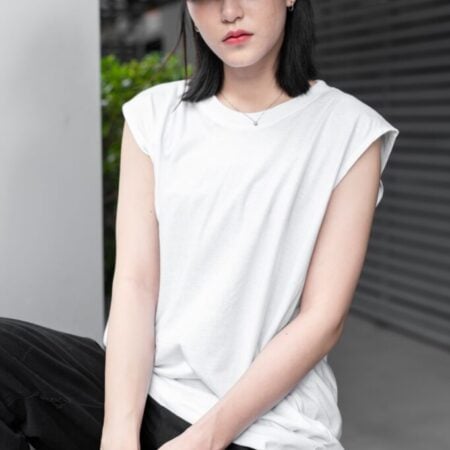 Female model with Oversized Tank Top White T-shirt.