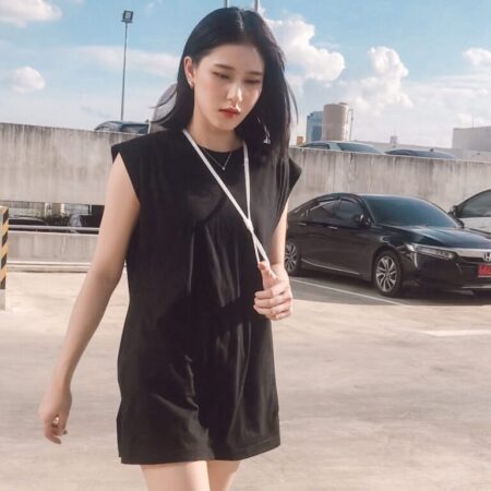 Female model with Oversized Tank Top Black T-shirt.