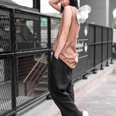 Female model with Oversized Tank Top Light Chocolate T-shirt.