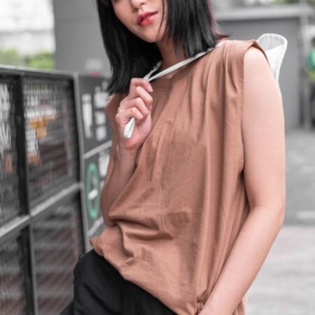 Female model with Oversized Tank Top Light Chocolate T-shirt.