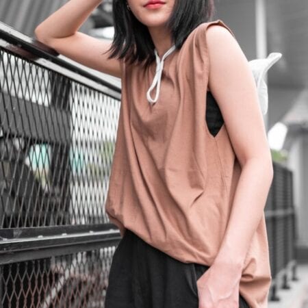 Female model with Oversized Tank Top Light Chocolate T-shirt.