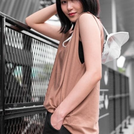 Female model with Oversized Tank Top Light Chocolate T-shirt.
