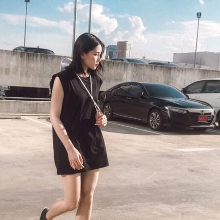 Female model with Oversized Tank Top Black T-shirt.