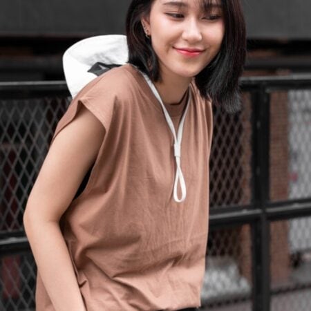 Female model with Oversized Tank Top Light Chocolate T-shirt.