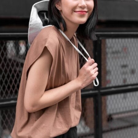 Female model with Oversized Tank Top Light Chocolate T-shirt.